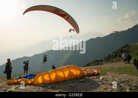 A paraglider flyer gets ready for take off at Bir Billing, Himachal Pradesh Stock Photo