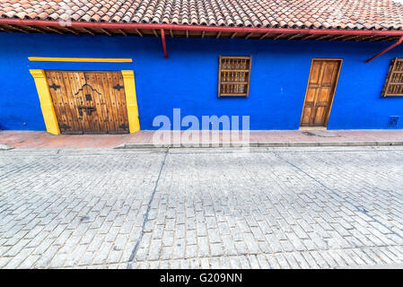 Blue colonial architecture in La Candelaria neighborhood in Bogota, Colombia Stock Photo