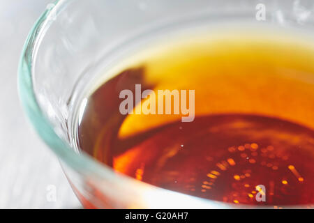 A dish of fermented fish sauce, a common condiment in Thai and Vietnamese cuisine Stock Photo