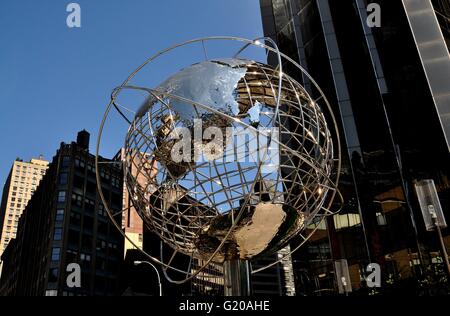 New York City  Stainless steel Unisphere sculpture in front of the Trump Intenational Hotel and Tower at Columbus Circle Stock Photo