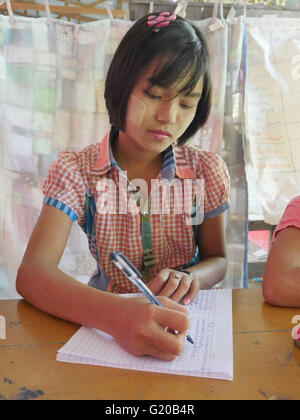 MYANMAR Saint Rita's boarding house for girls and boys at Maubin. The children, coming from remote villages, stay here so they can attend local schools. Class taught by Thuzer Win. Stock Photo