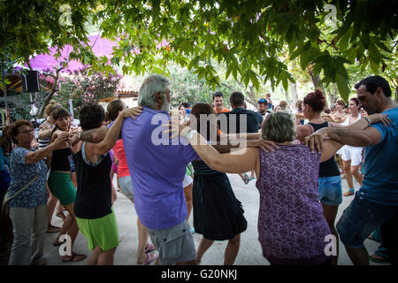 people playing music and dancing at Ikaria island festival, Greece Stock Photo