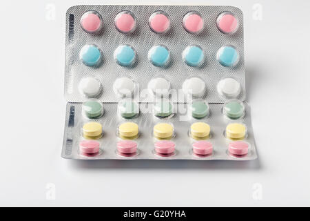 Colorful vitamins in a blister pack on white background Stock Photo