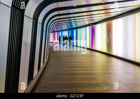London, United Kingdom - April 30, 2016: 90 meters long curved foot tunnel with an LED integrated lightwall Stock Photo