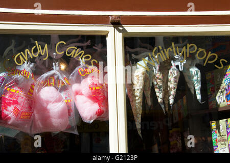 Sweets and candy floss in shop window, Hastings, UK Stock Photo