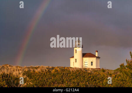 Coquille River Lighthouse and rainbow; Bandon, southern Oregon coast. Stock Photo