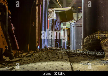 Coal cars on vintage trains in roundhouse. Stock Photo