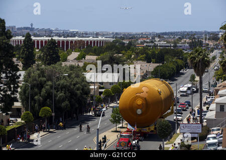 Inglewood, California, USA. 21st May, 2016. The ET-94 fuel tank for the Space Shuttle makes its way on Manchester past The Forum from Marina Del Rey to the California Science Center on Saturday, May 21, 2016 in Inglewood, Calif. NASA's last remaining external fuel tank for the Space Shuttle, ET-94, traveled over 16 miles to be united with the Endeavor, where the 66,000 pound fuel tank will be displayed like it is ready to launch. © 2016 Patrick T. Fallon © Patrick Fallon/ZUMA Wire/Alamy Live News Stock Photo