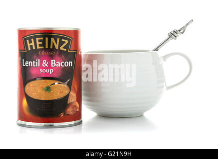 Heinz lentil and Bacon soup with bowl and spoon on a white background Stock Photo