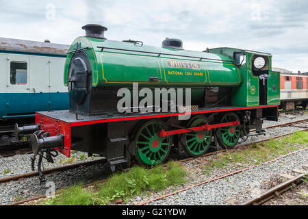 Restored Hunslet 0-6-0 saddle tank Austerity class steam engine locomotive at Nottingham Transport Heritage Centre, Ruddington, Nottinghamshire Stock Photo