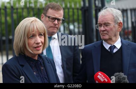 Alan Black (right), the sole survivor of a sectarian massacre of 10 protestant workmen in 1976 near the Co Armagh village of Kingsmill, and Karen Armstrong (left), whose brother John McConville was murdered, are joined by their legal representative Kevin Winters (centre) outside Belfast Coroner's Court, as an inquest into the sectarian murder of 10 Protestant workmen by the IRA in Northern Ireland 40 years ago begins today. Stock Photo