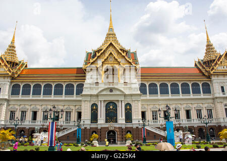 BANGKOK, THAILAND - AUGUST 21, 2014: Unidentified people by the Grand Palace in Bangkok. It is a complex of buildings at the hea Stock Photo