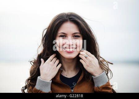 Man Smile Using Smart Phone Call, Communication On Line Social Message Near Window Stock Photo