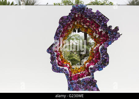 London, UK. 23 May 2016. A floral display in honour of HM Queen Elizabeth II who celebrated her 90th birthday in April. Press day at the RHS Chelsea Flower Show. The 2016 show is open to the public from 24-28 May 2016. Credit:  Vibrant Pictures/Alamy Live News Stock Photo