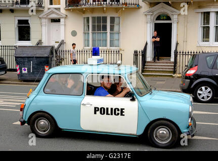 Brighton, UK. 22nd May 2016. Fake mini police car at the conclusion of the London to Brighton Mini Run which assembled at Crystal Palace a day earlier. The event is orgamised by the London & Surrey Mini Owners Club. Credit:  Scott Hortop / Alamy Live News Stock Photo