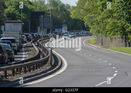 Northolt, London, UK. 23rd May 2016. The Parkway A413 was closed after a man believed to be in his twenties was stabbed. A silver car remained inside a police corden Credit:  Peter Manning/Alamy Live News Stock Photo