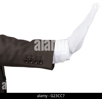 Mans hand in white glove showing stop gesture Stock Photo