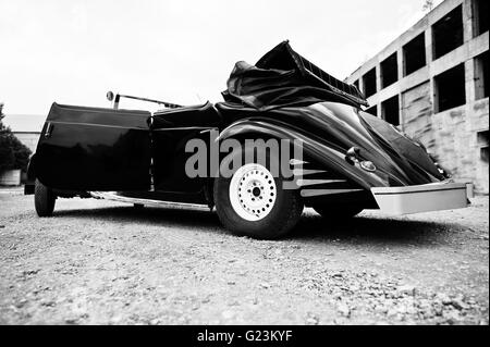 Side of the old vintage retro car. Black and white photo Stock Photo