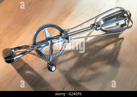 Old Vintage Manual Egg Beater. Spring Coil Wire Whisk Stock Image