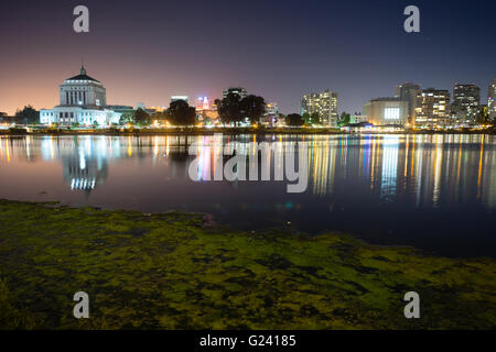 Oakland California buildings reflected in Lake Merritt Stock Photo