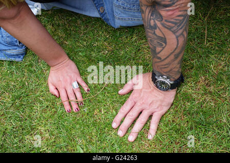 hands of young couple at rock 'n roll meeting, Venlo Netherlands Europe Stock Photo