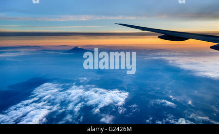 View of Mount Fuji through airplane window Stock Photo