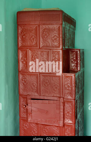 Firebrick old stove in a room in natural light Stock Photo