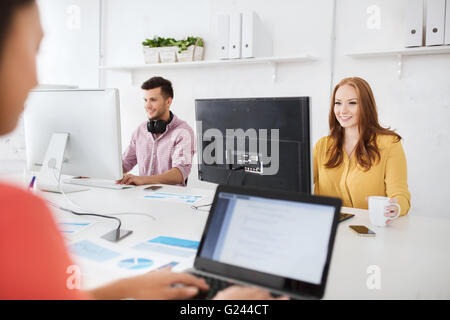 creative team with computers working at office Stock Photo