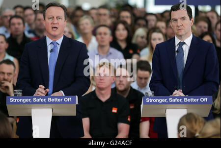 Chancellor George Osborne (right) listens as Prime Minister David ...