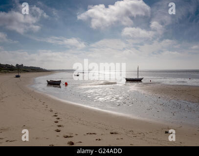 Hjerting, Denmark. Small boats on Hjerting beach with Esbjerg in the background on a beautiful September morning. Stock Photo