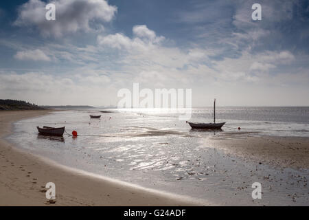 Hjerting, Denmark. Small boats on Hjerting beach with Esbjerg in the background on a beautiful September morning. Stock Photo