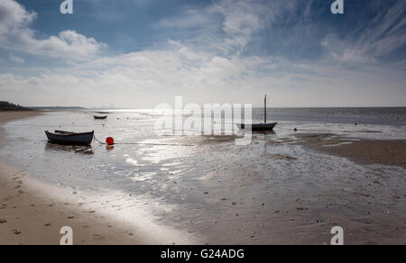 Hjerting, Denmark. Small boats on Hjerting beach with Esbjerg in the background on a beautiful September morning. Stock Photo