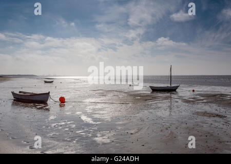 Hjerting, Denmark. Small boats on Hjerting beach with Esbjerg in the background on a beautiful September morning. Stock Photo