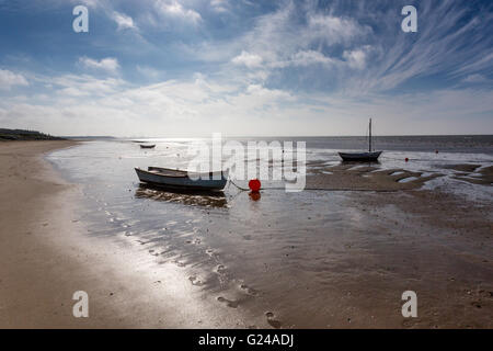 Hjerting, Denmark. Small boats on Hjerting beach with Esbjerg in the background on a beautiful September morning. Stock Photo