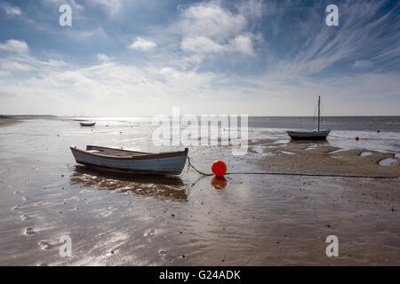 Hjerting, Denmark. Small boats on Hjerting beach with Esbjerg in the background on a beautiful September morning. Stock Photo