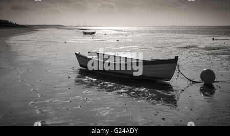 Hjerting, Denmark. Small boats on Hjerting beach with Esbjerg in the background on a beautiful September morning. Stock Photo