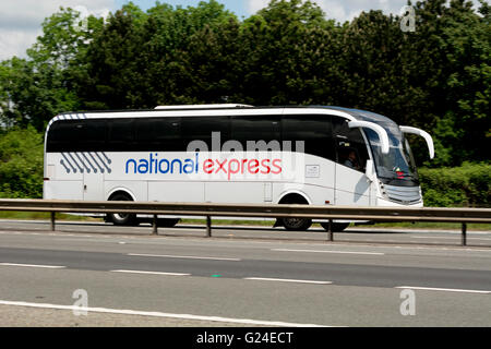 A National Express coach on the M40 motorway, Warwickshire, UK Stock Photo