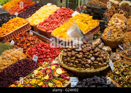 Assorted dried fruit and nuts for sale at La Boqueria, Barcelona, Spain Stock Photo