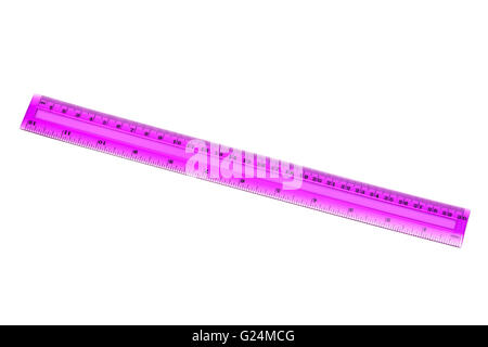 plastic pink ruler on a white background Stock Photo