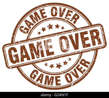 game over brown grunge round vintage rubber stamp Stock Photo