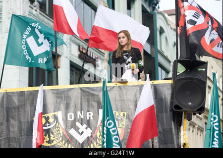 Wroclaw, Poland. 02nd Apr, 2016. Justyna Helcyk, Coordinator of ONR  (National Radical Camp)delivers a speech during anti immigrant and anti  Muslim protest organized by Oboz Narodowo-Radykalny (National Radical Camp)  in Wroclaw, western