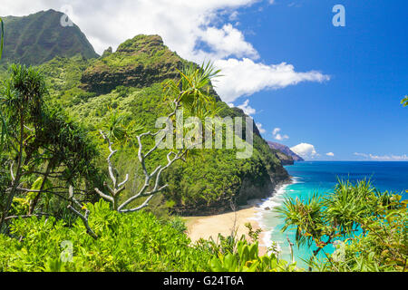 View of the Na Pali Coast and Hanakapiai Beach as seen from the Kalalau Trail on Kauai Stock Photo