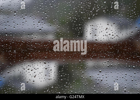 Raindrops on a window pane Stock Photo