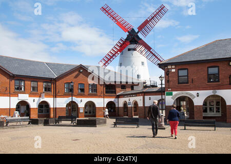 Marsh Mill, 18th-century tower windmill, structure, style, tiling, tourism, rustic, sails, shops, tourist village;  Marsh Mill isa  working windmill, is a ‘gristmill’ – one which grinds grain to flour and is a prominent local landmark at Thornton, Fleetwood Road North, Thornton-Cleveleys, Lancashire, Stock Photo