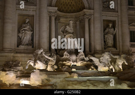 Beautiful Trevi Fountain with Ocean god and tritons statues Stock Photo