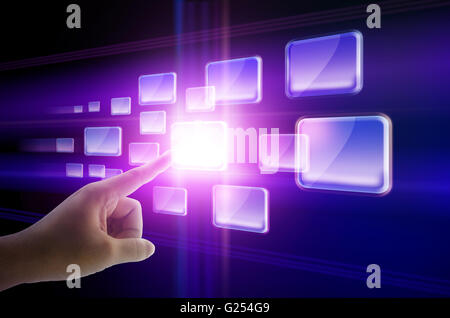 Hand pushing a button on a touchscreen interface Stock Photo