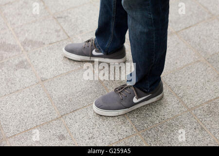 Man wearing Nike canvas shoes - USA Stock Photo