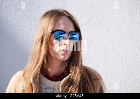 Portrait of a woman wearing sunglasses Stock Photo