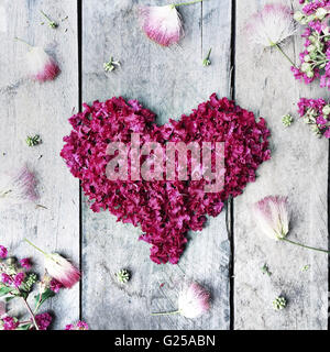 pink heart made from crepe myrtle flowers Stock Photo