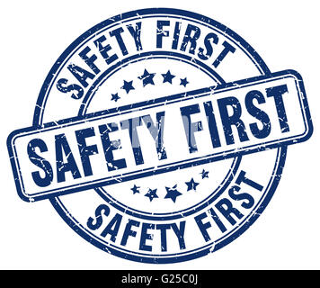 safety first round blue sticker isolated on white Stock Photo - Alamy